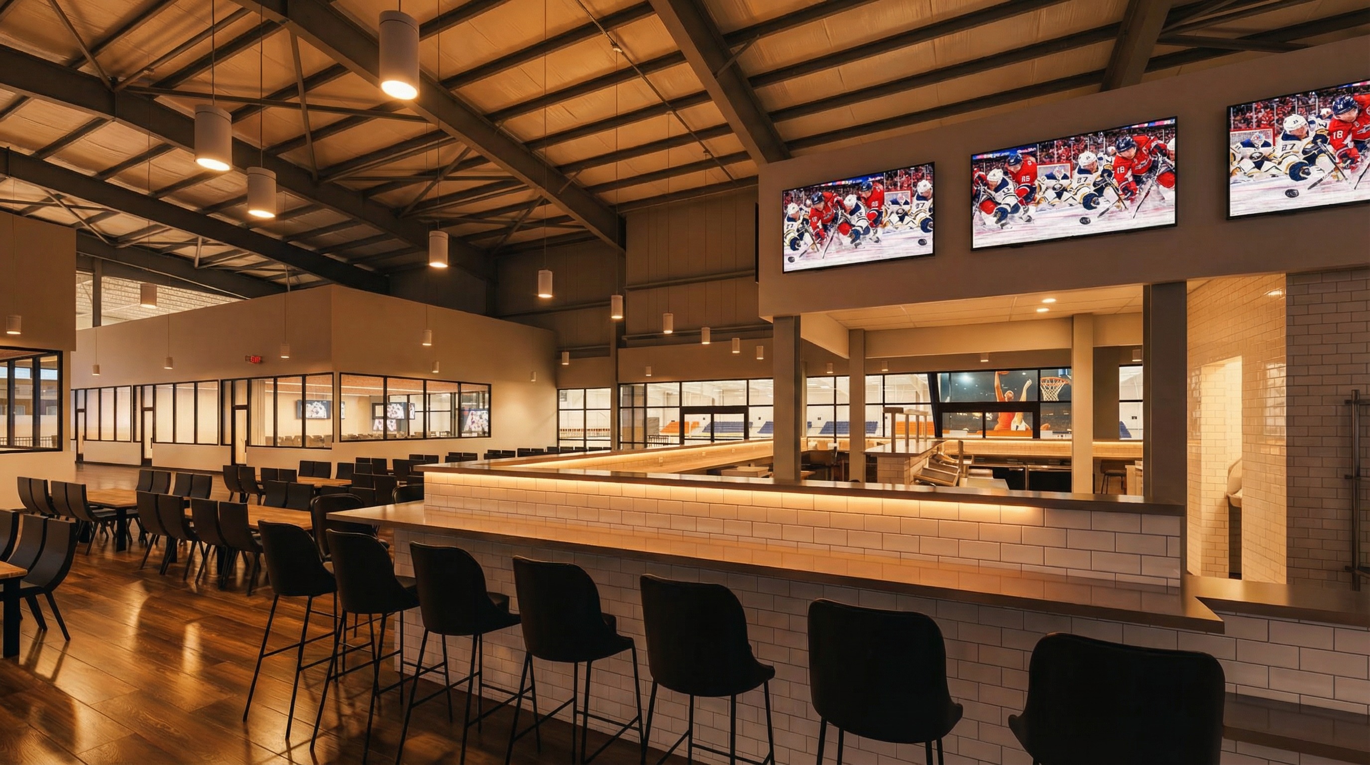 Cross Bar sports bar interior with white subway tile, wood floors, and modern furniture